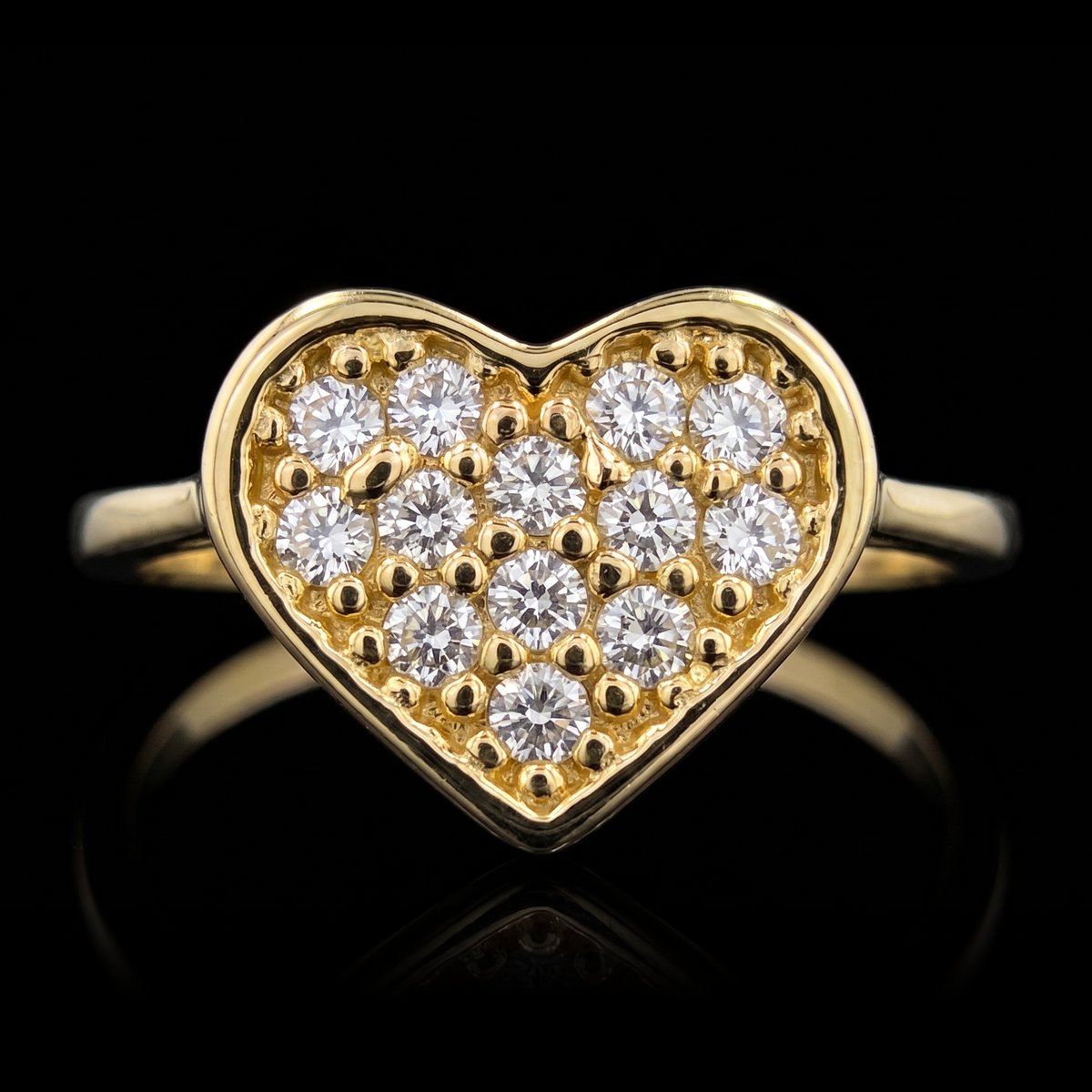 10k gold CZ pave heart ring, pave heart front view on black