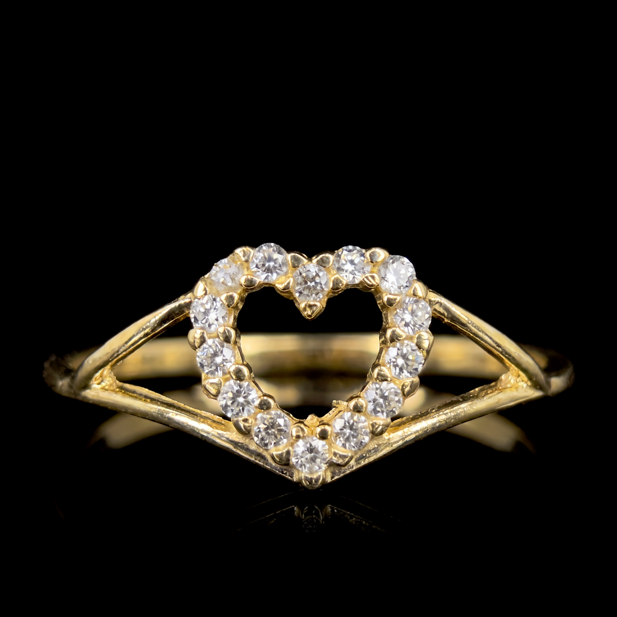 10k gold CZ open heart ring, open heart front view on black