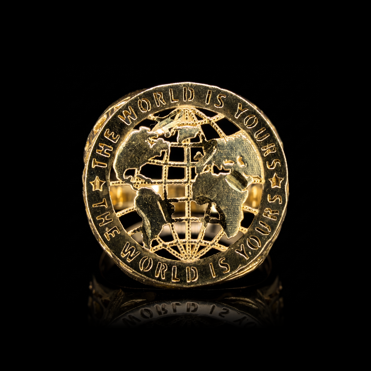 10k gold The World Is Yours ring 21mm, globe face front view on black