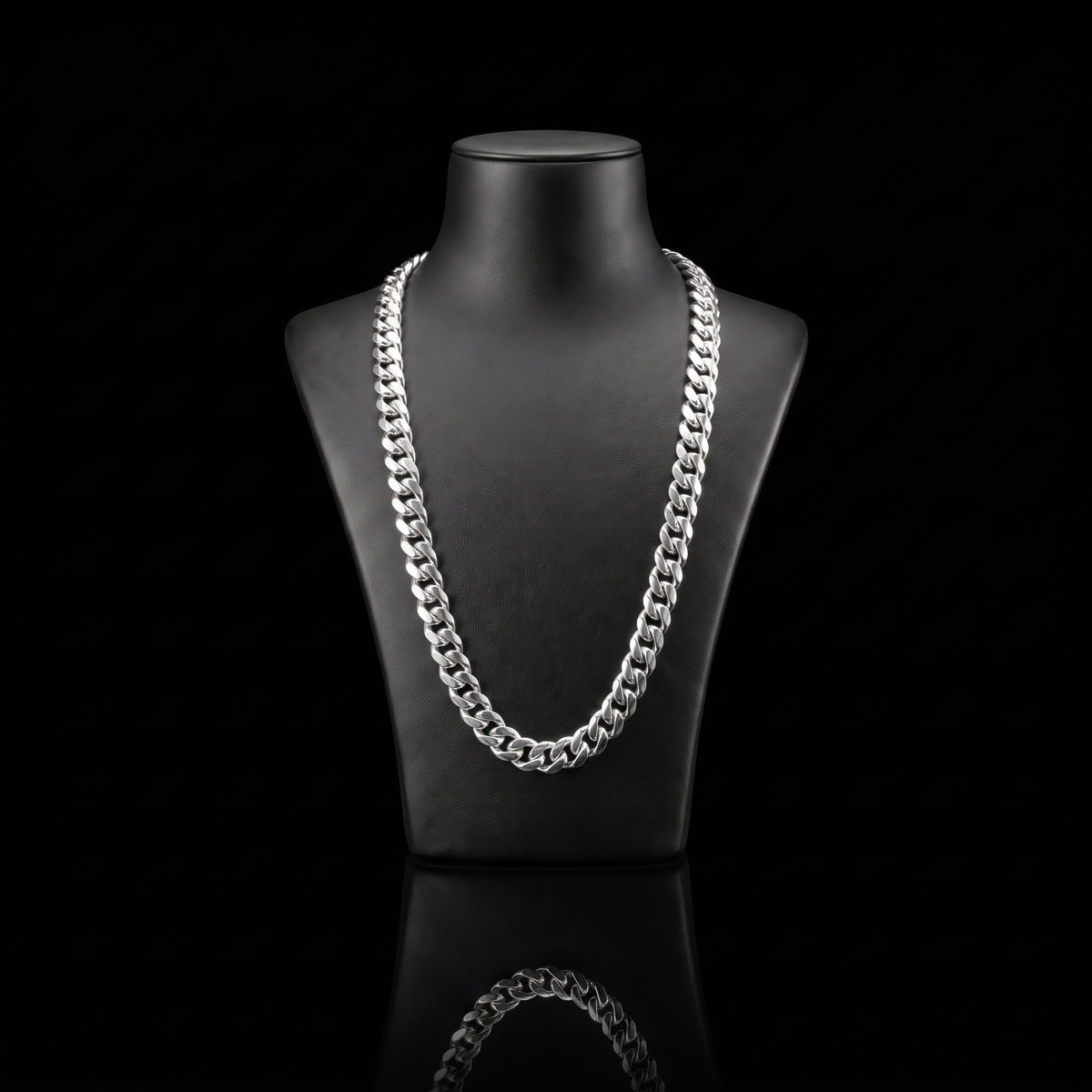 Silver 925 solid miami cuban chain 7mm draped on a black jewelry bust, front view