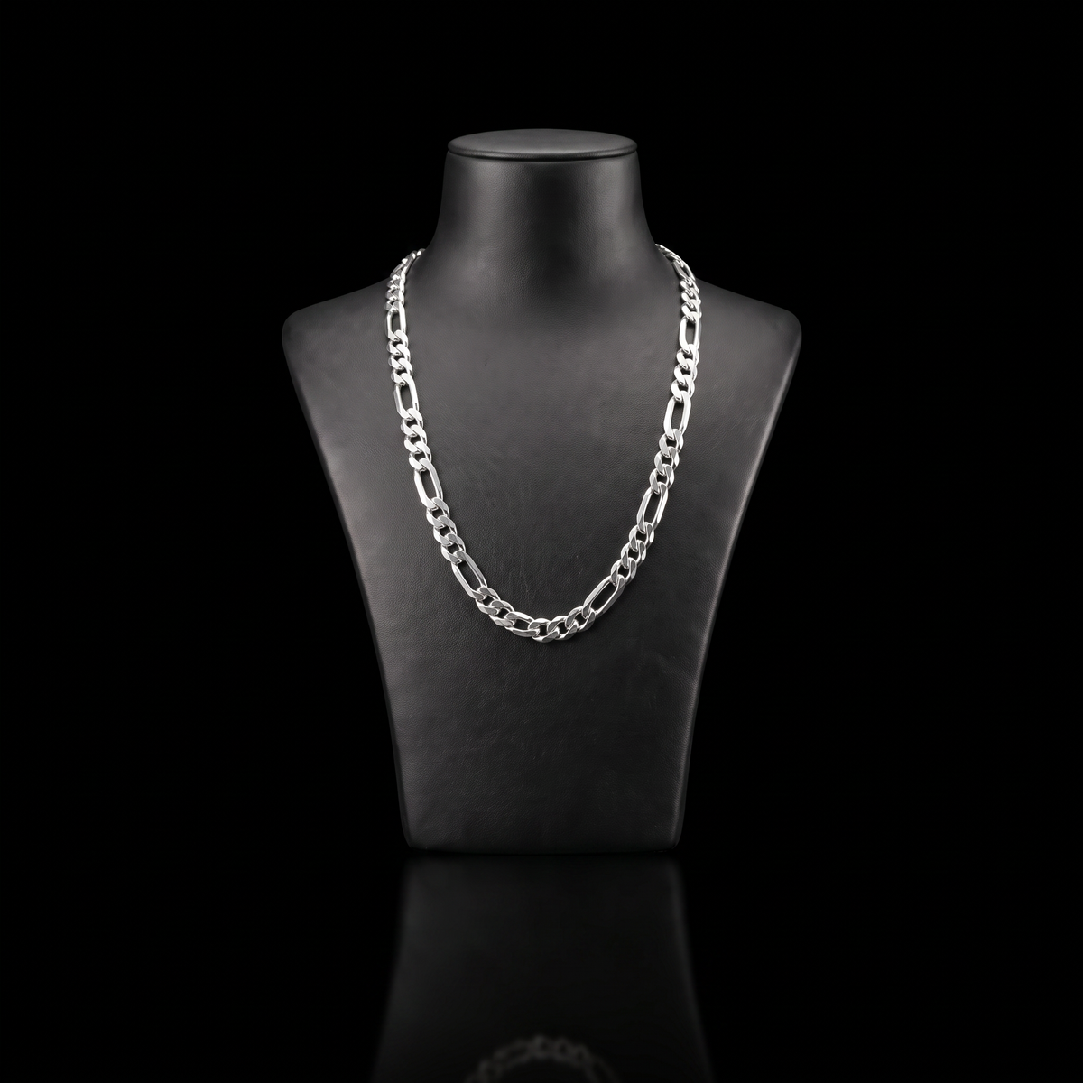 Silver 925 solid figaro chain 5.6mm draped on a black jewelry bust, front view