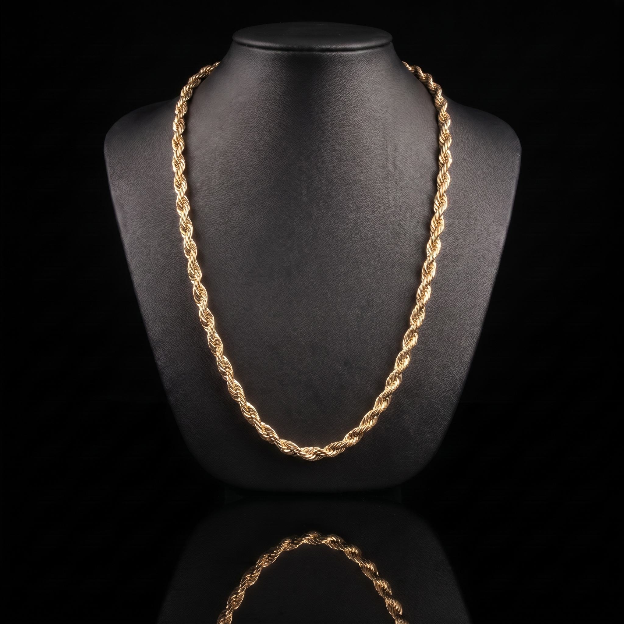 10k gold solid diamond-cut rope chain draped on a black jewelry bust, front view