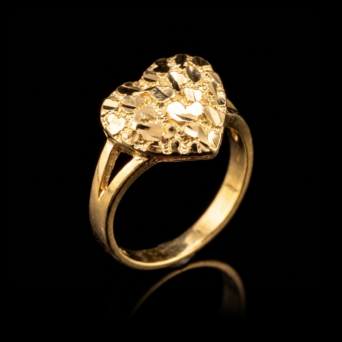 10k gold heart nugget ring 10mm at a 45-degree angle on black