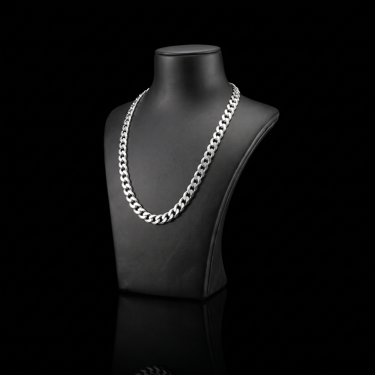 Silver 925 solid curb chain 6.1mm on a black jewelry bust at a 45-degree angle