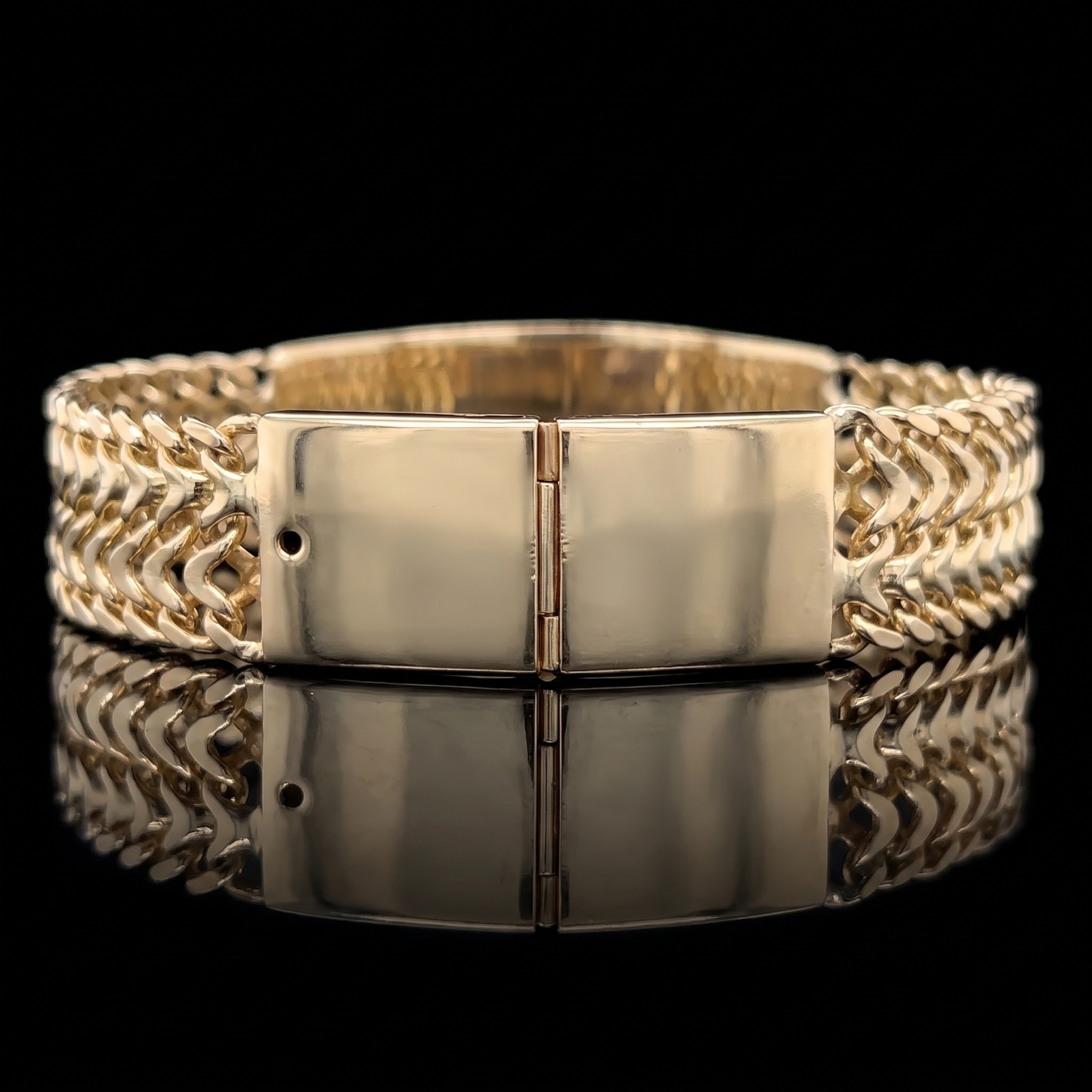 Flat slide clasp of the 10k gold petatillo ID bracelet, closed
