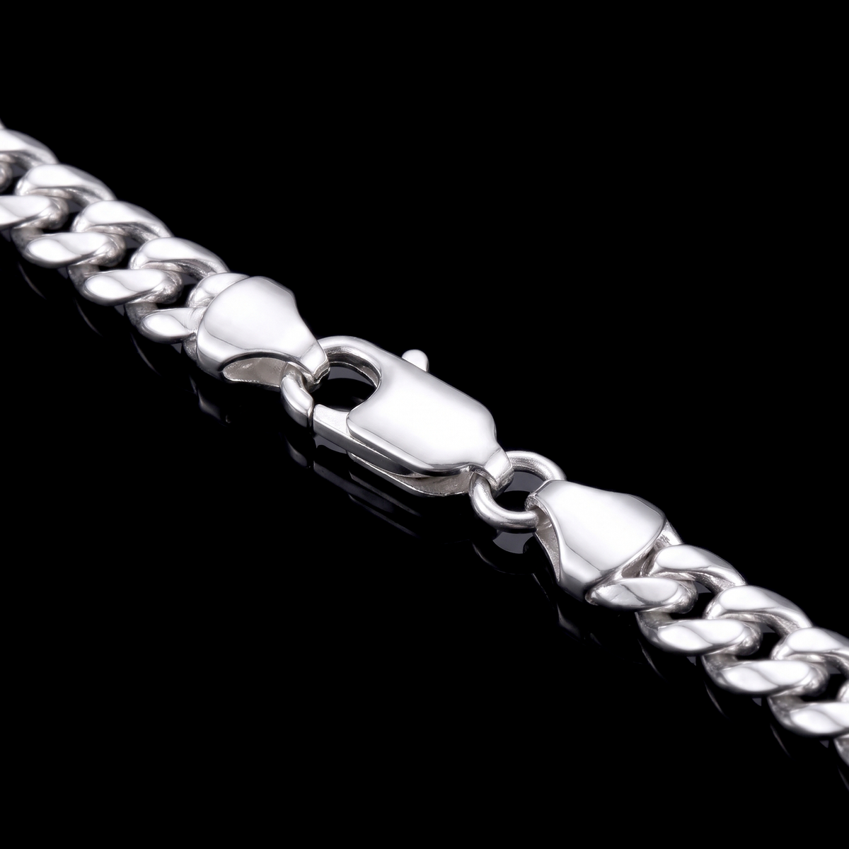 Silver 925 solid miami cuban chain lobster clasp macro on black