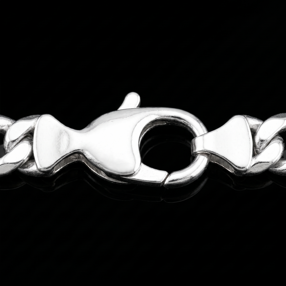 Silver 925 solid figaro chain lobster clasp macro on black