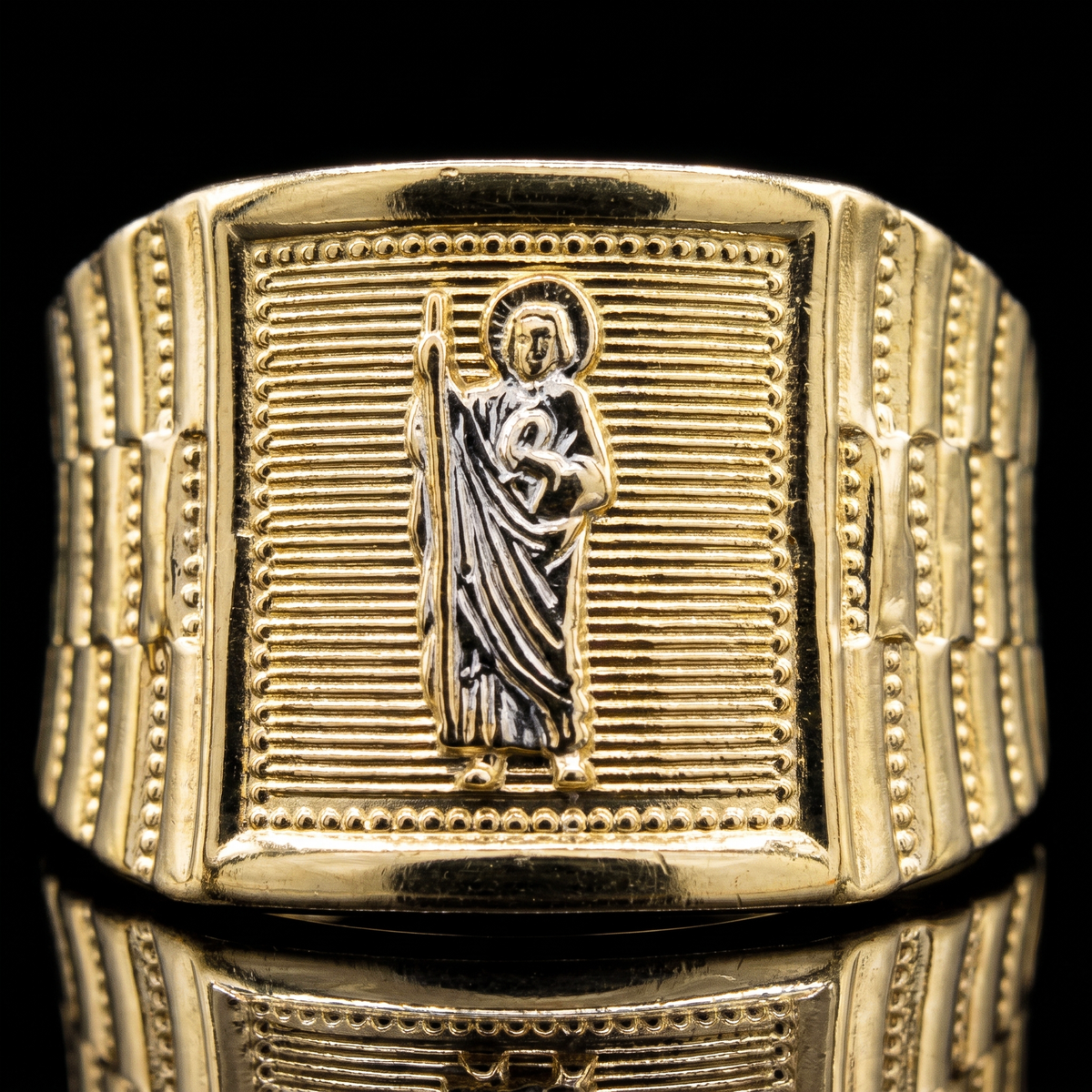 10k gold two-tone Rolex Saint Judas ring 13.5mm white gold Saint Judas face detail macro on black