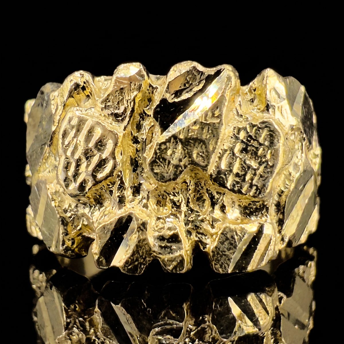 10k gold nugget ring 7.5mm nugget face detail macro on black