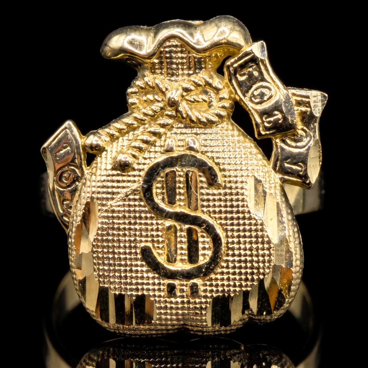10k gold money bag ring 21mm money bag face detail macro on black