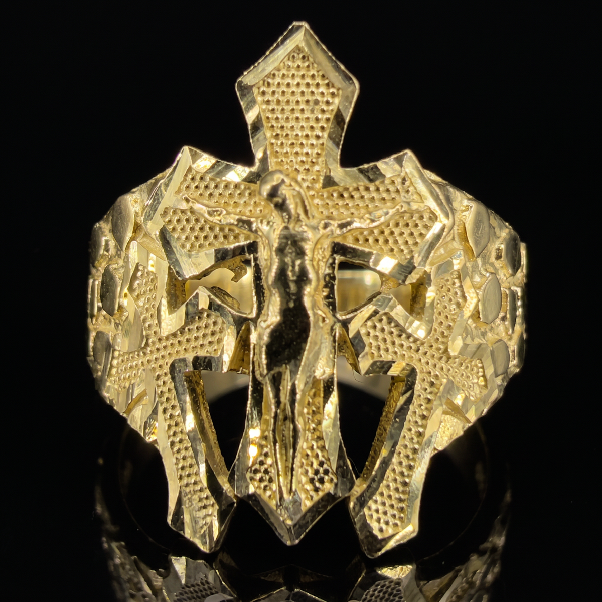 10k gold nugget 3 cross crucifix ring 21mm three-cross crucifix face detail macro on black