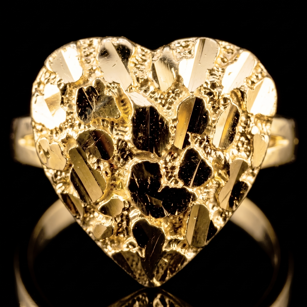 10k gold heart nugget ring 10mm heart nugget face detail macro on black
