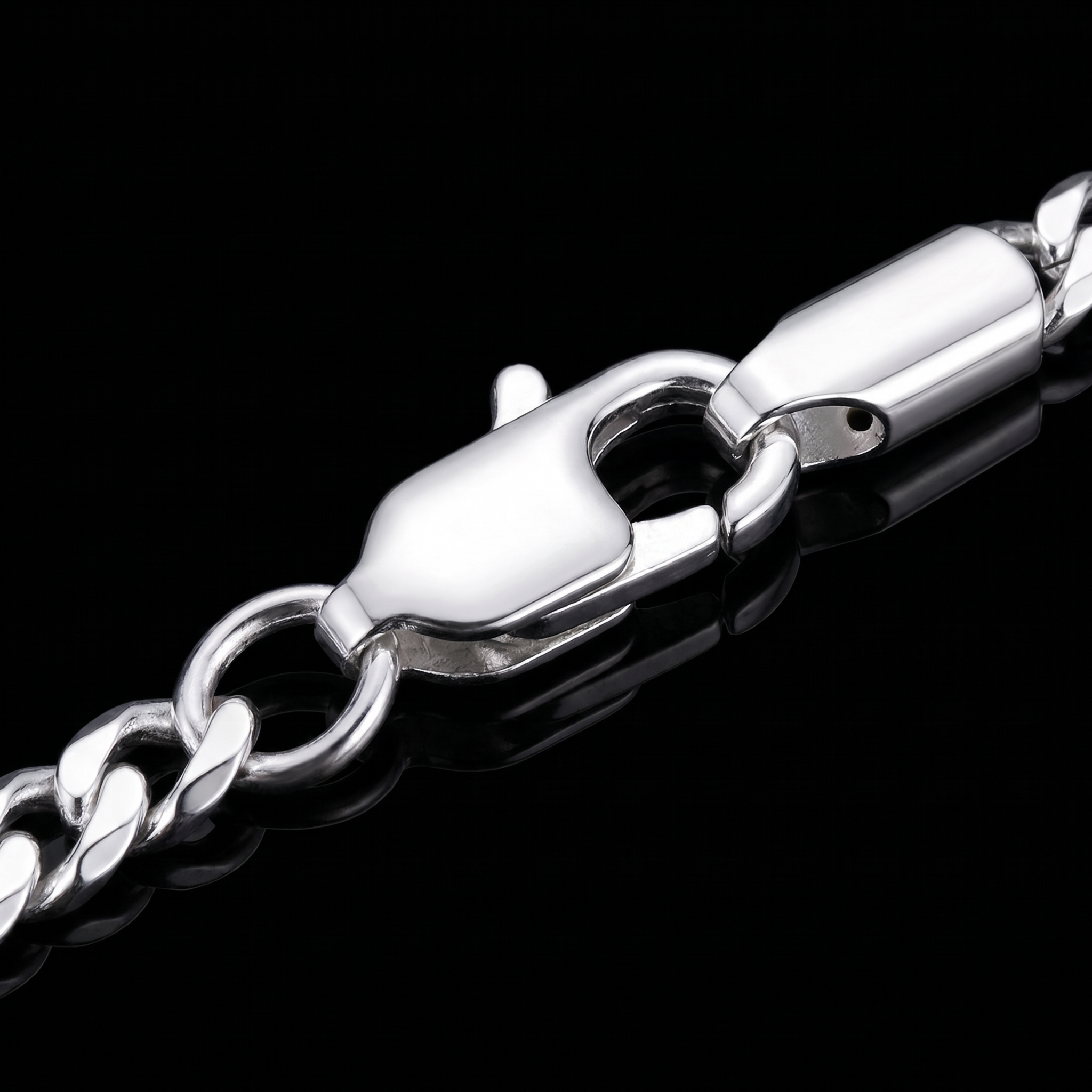 Silver 925 curb bracelet lobster clasp macro on black