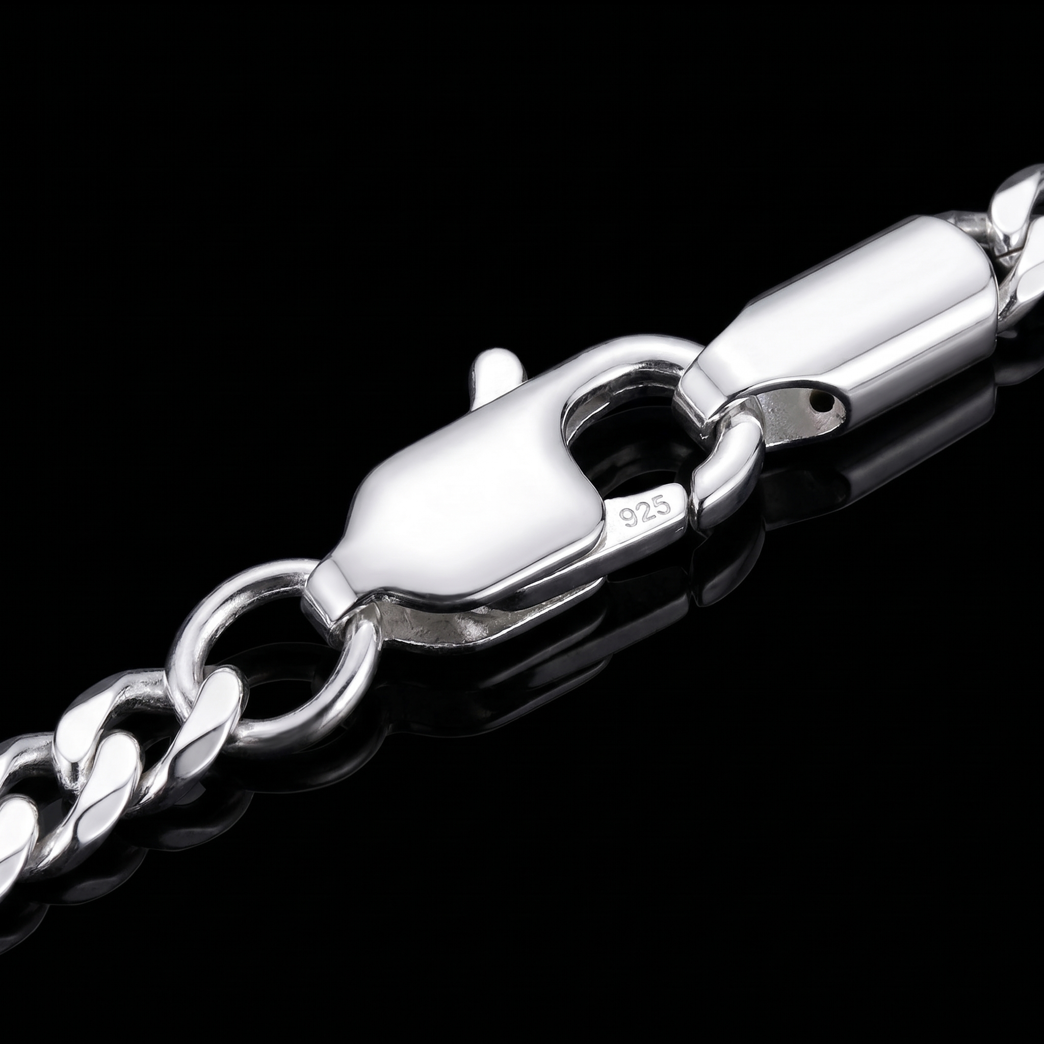 Silver 925 Miami Cuban chain lobster clasp macro on black